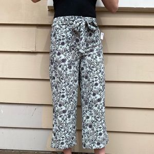Loft floral pants! Light blue colored w/  black floral pattern! Size 10